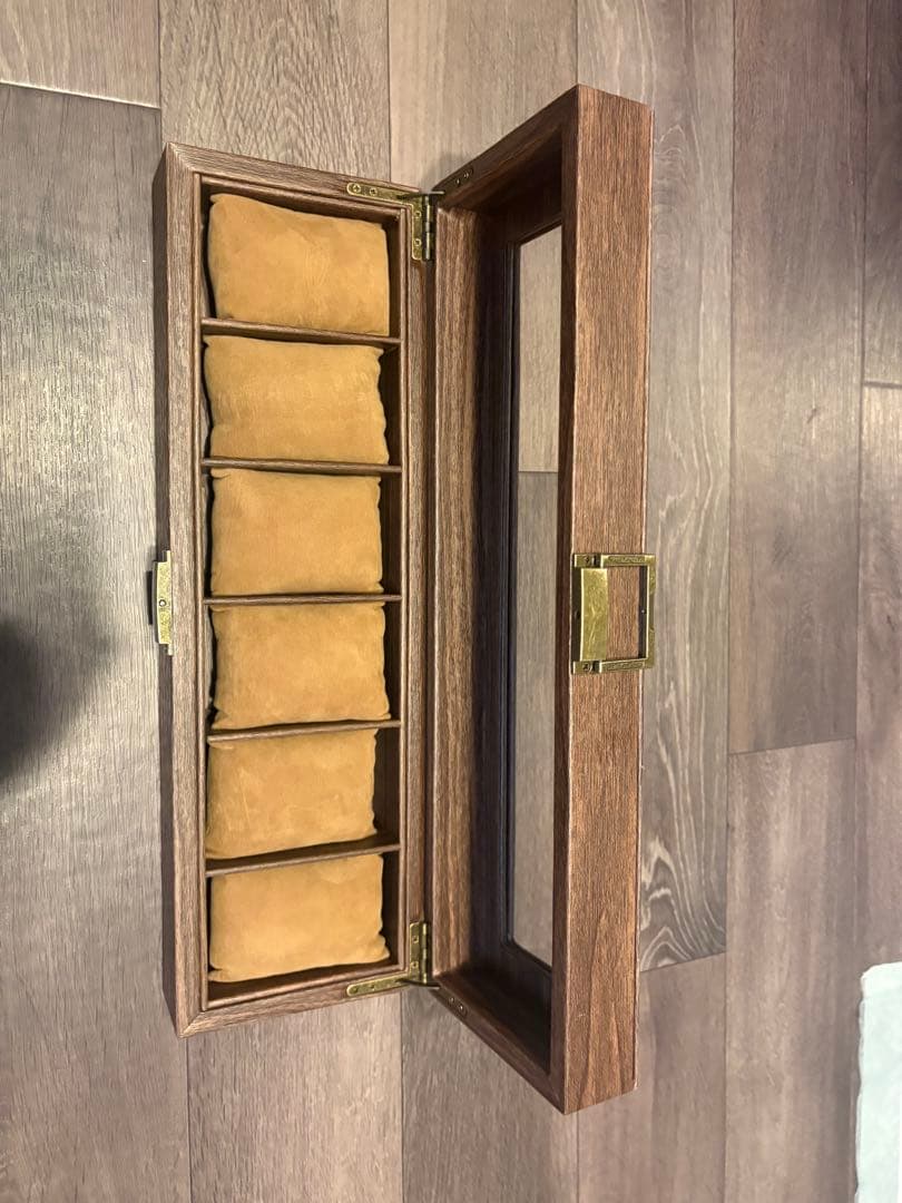 A collection case for watches (holds 6 watches).